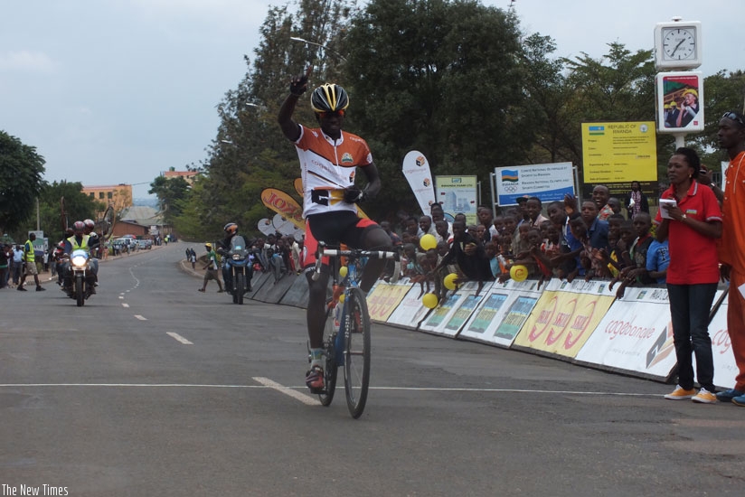 Jean-Claude Uwizeye of Les Amis Sportifs crosses the finish line in an emphatic victory yesterday. (Courtesy)