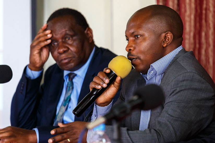 Telesphore Ndabamenye head of crop production and food security speaks as Phillip Kiriro president of East Africa Farmers Federation looks on. (All photos by T.Kisambira)