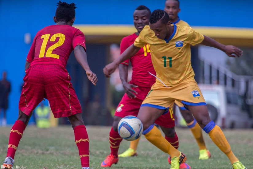 Amavubi midfielder Patrick Sibomana (number 11) in action against Ghana after coming off the bench on Saturday, is expected to start in today's friendly against Gabon. (T. Kisambira)