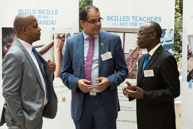 (L-R) Director General (WDA) Jerome Gasana,  Rwanda's Ambassador to Germany, Igor Cesar, and Permanent Secretary in the Ministry of Education, Dr. Celestin Ntivuguruzwa share a light moment. (Courtesy)