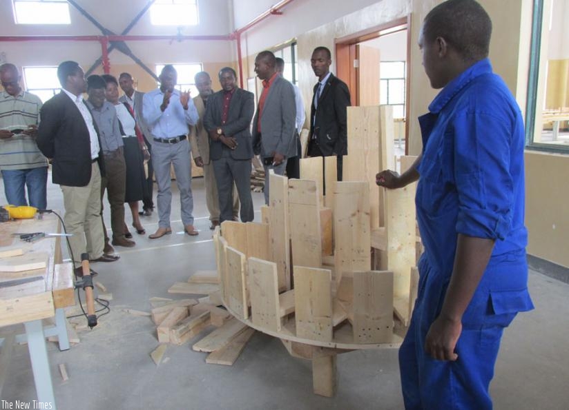 Varsity officials tour one of Musanze Polytechnic workshops. (J. Mbonyinshuti)