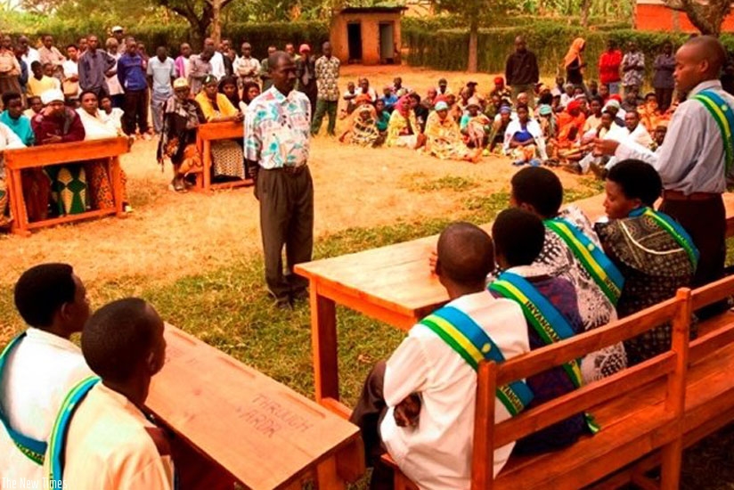 Some of the Gacaca judges (with shoulder bands) during one of the sessions of a Gacaca court. The former court adjudicators are crying foul after some of the leaders of the co-operatives they formed when they retired mismanaged their finances. (File)  