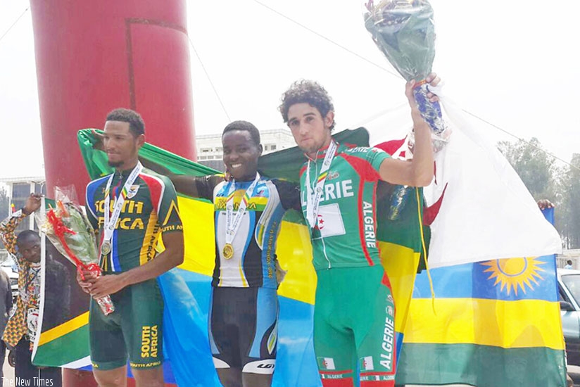 Janvier Hadi (C) poses with his gold medal alongside silver medalist Reynard Butler of South Africa (L) and bronze medalist Adil Barbari of Algeria (R). (Courtesy)