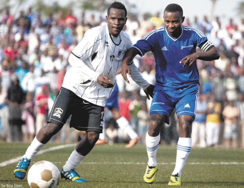 Charles Tibingana,(left), has been offered a one-year contract by Malawian league champions Big Bullets FC. (T. Kisambira)