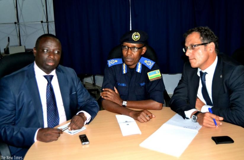 L-R; Siboyintore, Kuramba and Carvelli during a news briefing in Kigali yesterday. The US has offered up to $5m for information leading to arrest of each of the key nine Genocide fugitives. (Courtesy)