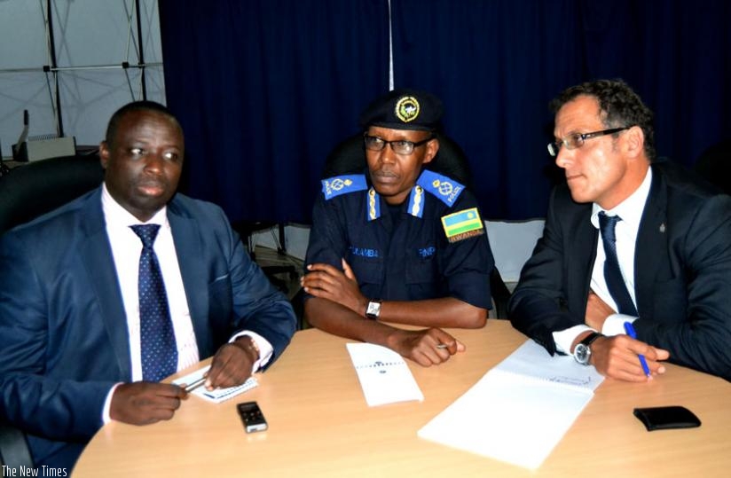 L-R; Siboyintore, Kuramba and Carvelli during a news briefing in Kigali yesterday. The US has offered up to $5m for information leading to arrest of each of the key nine Genocide fugitives. (Courtesy)