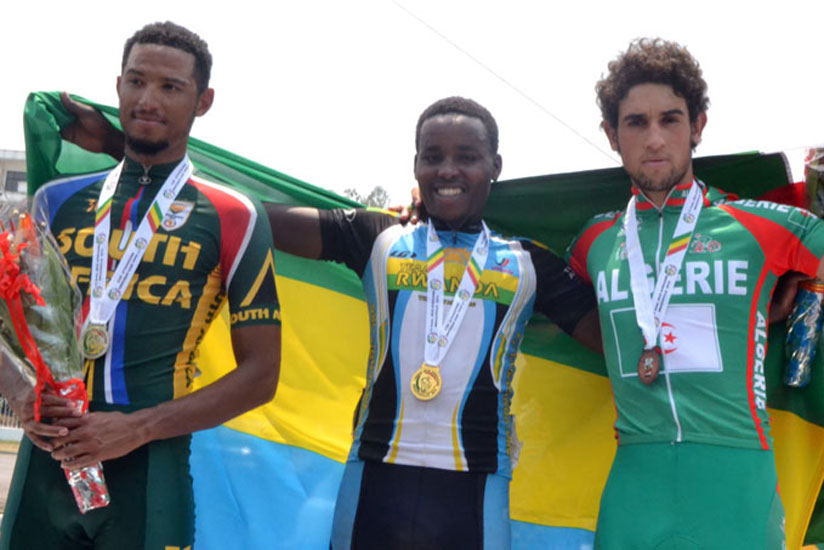 Hadi Janvier (C) wins gold for Rwanda in All Africa Games