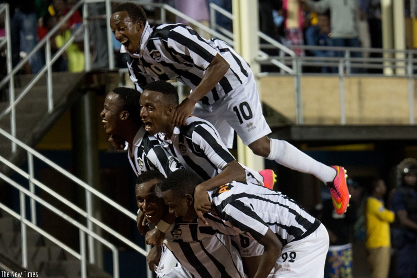 APR players celebrate after defeating Rayon Sports last season. The league champions start their title defence today against Etincelles. (File)