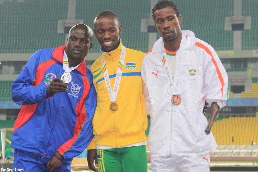 Muvunyi (C) poses with silver medalist Elias Ndimulunde (L) from Namibia and bronze winner Jean Luc Noumbo (R) from Cote d'Ivoire. (Courtesy)rn