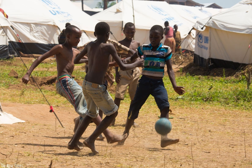 Refugee children play football at Mahama Refugee Camp. Sixty per cent of the Burundian refugees are children. (T.Kisambira)