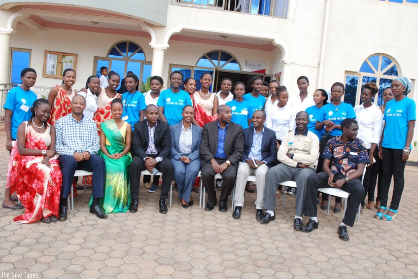 Officials, teachers, trainers and the students pose for a group photo at the inauguration of Itorero activities at Akilah Institute. (Julius Bizimungu)
