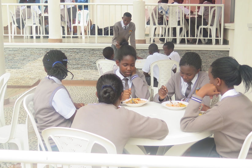 Excella students during lunch break. The Education ministry has banned canteens inside school compounds. (File)
