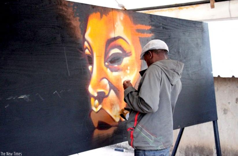 A graffiti artist at work.