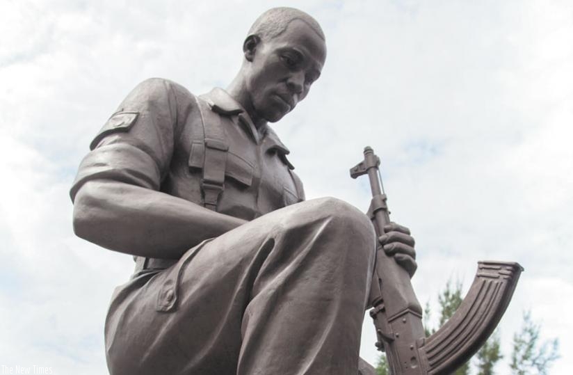 A monument erected at Parliament Buildings showing a former RPF combatant mourning the fallen comrades killed during the liberation struggle. (File)