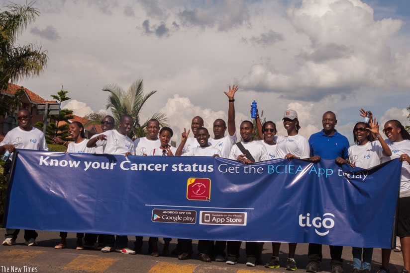Tigo staff during the breast cancer walk last year. Cancer experts have called for more measures in raising awareness about the disease around the country. (File)