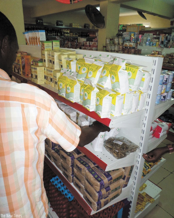 A shopper examines assorted fortified foods, including baby soya, at a city supermarket. (File)