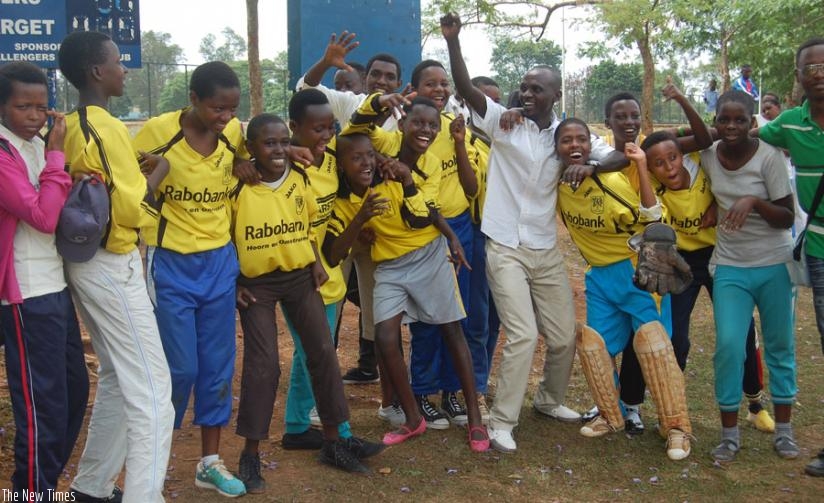 Kagarama SS boys' team celebrate after receiveing the trophy. (Courtesy)