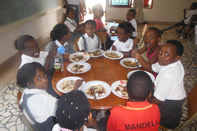 Government argues that eating school food together promotes unity among learners. (Dennis Agaba)