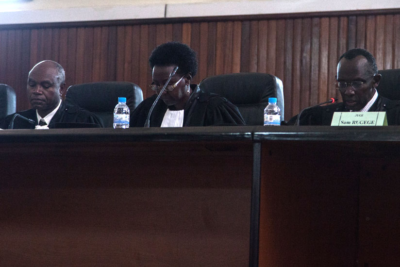 Chief Justice Sam Rugege (R) delivers the verdict at the Supreme Court earlier today. (Faustin Niyigena)