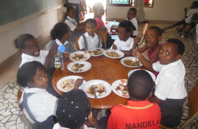 Pupils of Excella  School have their lunch. (File)