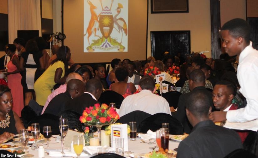 Guests have a good time at the event to mark Uganda's 53rd Independence Day in Kigali. (Moses Opobo)