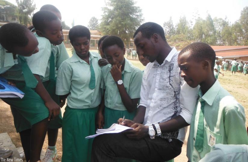 A teacher guides learners after they consulted him. Now is the time to consult your teacher on academic matters. (Dennis Agaba)