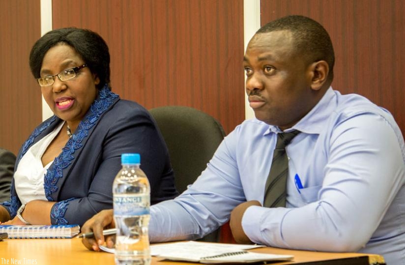 The Minister for Disaster Management and Refugee Affairs, Seraphine Mukantabana (L), briefs the media on a new drive to integrate local and indigenous knowledge with science and technology in an effort to increase disaster resilience in the country. Looking on is Jean Baptiste Nsengiyumva, the director of risk reduction and preparedness at MIDIMAR. (Doreen Umutesi)