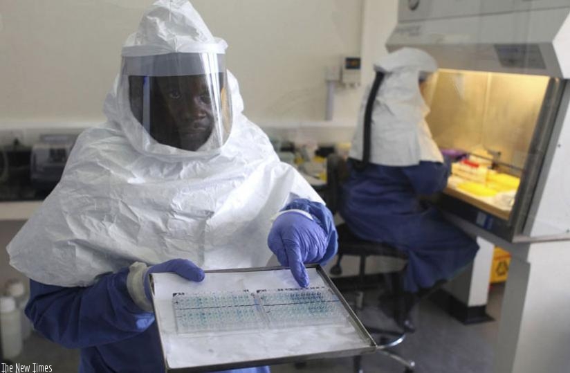 A doctor at the Centre for Disease Control in Entebbe. (Reuters/Edward Echwalu)