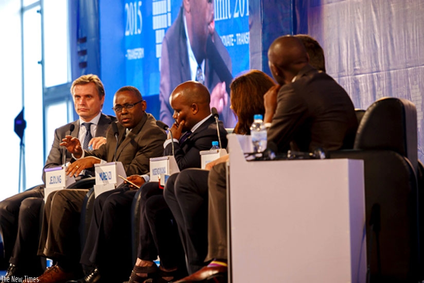 Prof. Murenzi (2ndL) speaks during the panel discussion at the Transform Africa 2015 summit yesterday. (T. Kisambira)