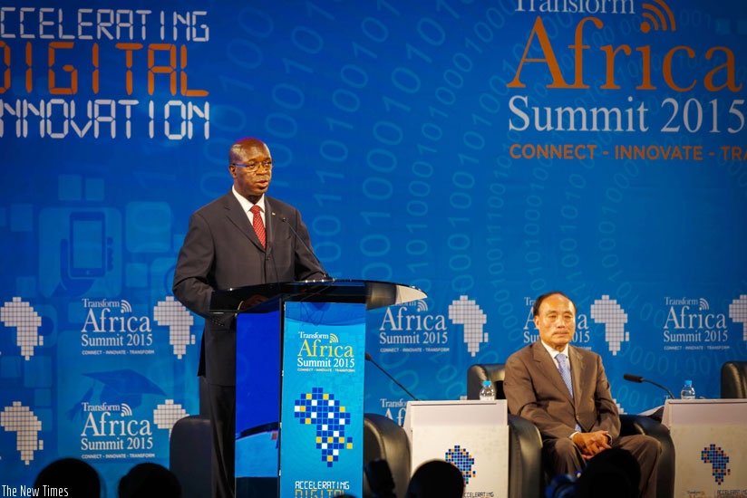 Prime Minister Anastase Murekezi (L) gives his openning remarks as Houlin Zhao, the secretary-general of the International Telecommunications Union, looks on yesterday. (All photos by Timothy Kisambira)