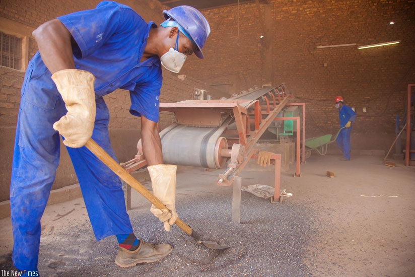 A worker sorts minerals at Mineral Supply Africa offices at Gikondo. (File)