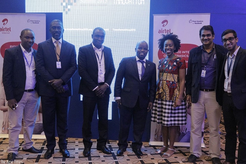 The Airtel Rwanda team pose for a photo with the Minister for Youth and ICT, Jean-Philbert Nsengimana (middle) at the launch of Facebook app during the Transform Africa summit yesterday. (Courtesy)