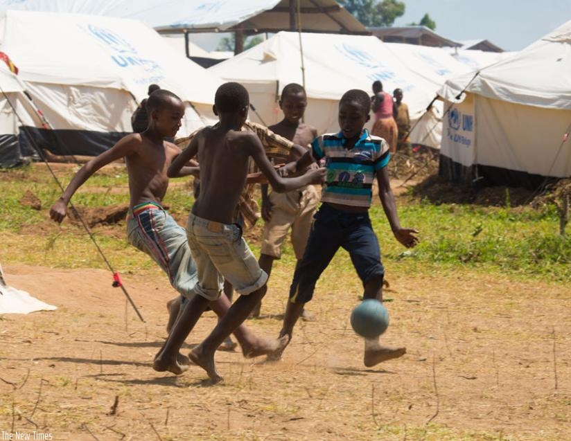 Burundian children play football at Mahama Refugee Camp. With the new developments at the camp, children will be able to get an education. (Timothy Kisambira)