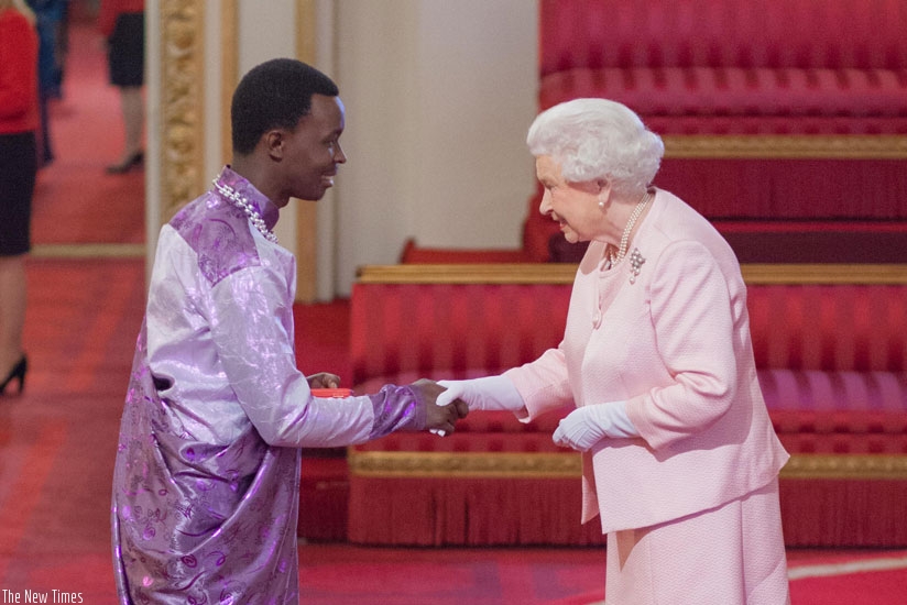 Jean d'Amour Mutoni receiving the Young Leader's Award from Queen Elizabeth II at Buckingham Palace in June this year. (Courtesy)