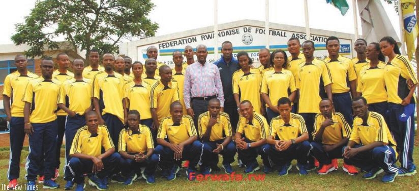 FERWAFA president Vincent Nzamwita (C) with the coaches who attended the training. (Courtesy)