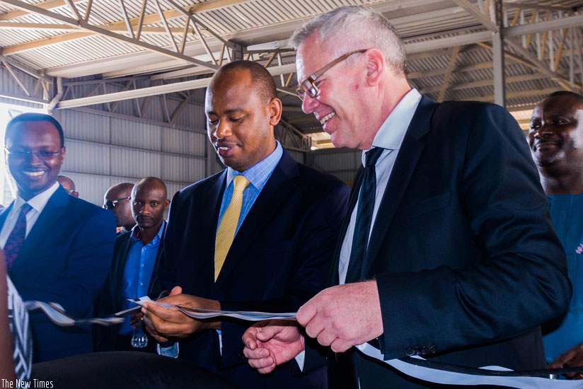 Nsengiyumva is flanked by Hategeka and Dauck as he commissions the plant last week. (Teddy Kamanzi)