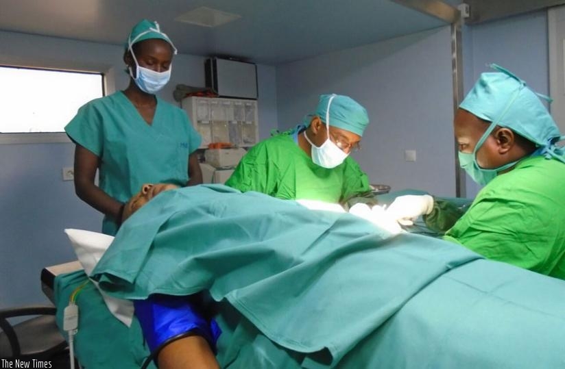 RDF medics perform a minor surgery on a patient at the Level 2 UN hospital inaugurated in the Central African Republic. (Courtesy)