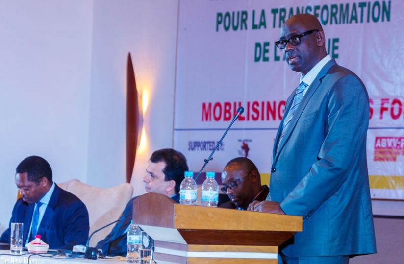 Johnston Busingye, the Minister for Justice, addresses the Pan-African Trade Union conference underway in Kigali yesterday. (Timothy Kisambira)