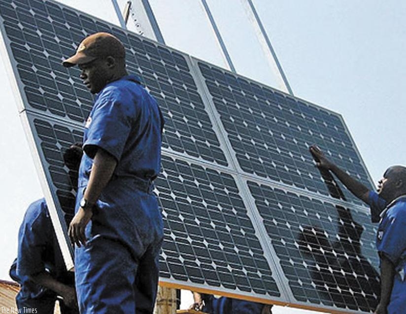 Technicians install solar panels. The annual iPAD forum aims at showcasing investment opportunities in Rwanda's infrastructure sector. (Net photo)