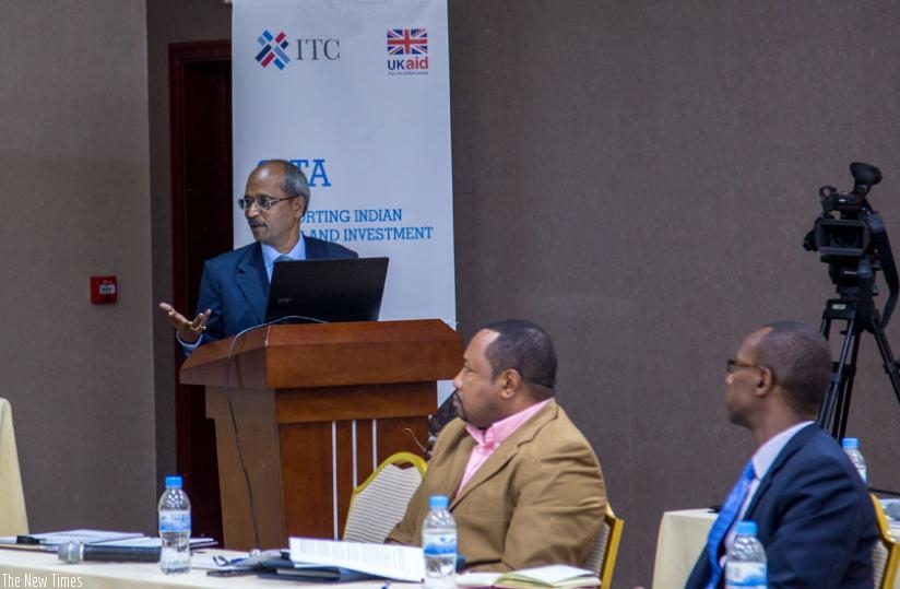 Ashok Phadtare, an ITC consultant, makes a presentation on the status of credit insurance and guarantee in Rwanda on Monday. (Doreen Umutesi)