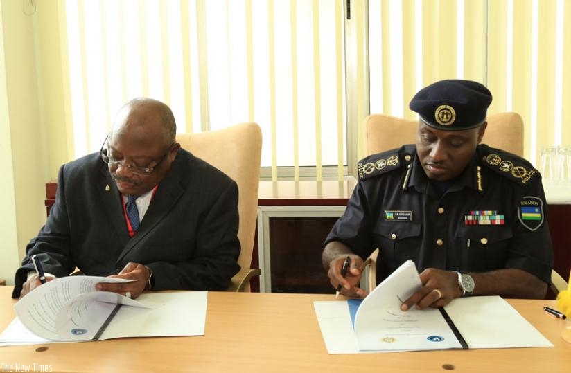 IGP Emmanuel K. Gasana and his Namibian counterpart Lt. Gen. Sebastian Ndeitunga sign the MoU  in Kigali, yesterday. (Courtesy)