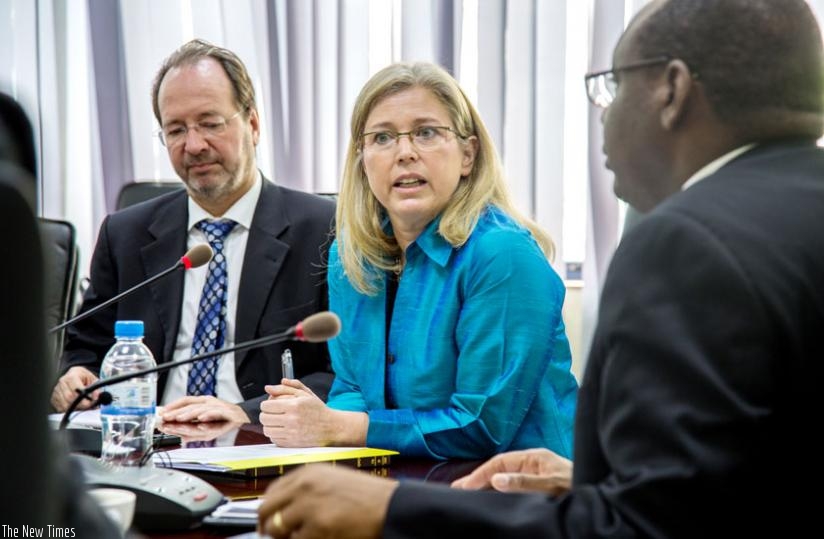 Redifer (C) addresses a joint media briefing with government officials at the Ministry of Finance and Economic Planning offices in Kigali yesterday. Looking on is Tobias Roy, a senior economist for African Department, and Finance minister Claver Gatete (with back to camera). (Doreen Umutesi)