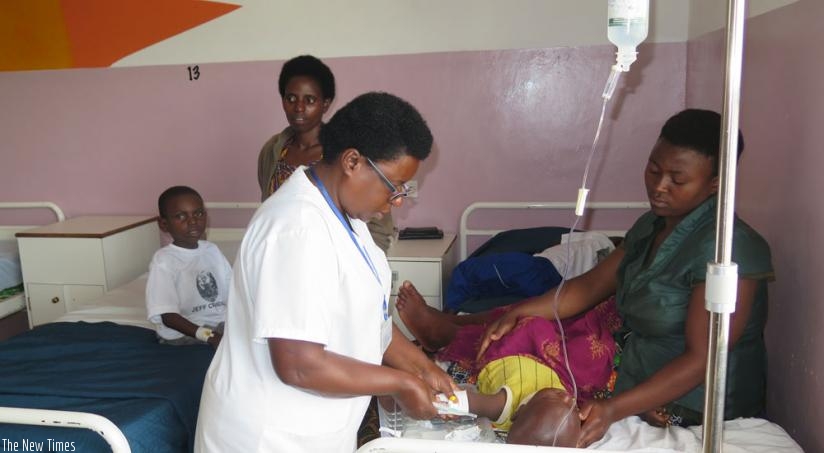 A nurse attends to a patient  in the new Kibogora Hospital paediatric facility in Nyamasheke District on Wednesday. (E. Ntirenganya)
