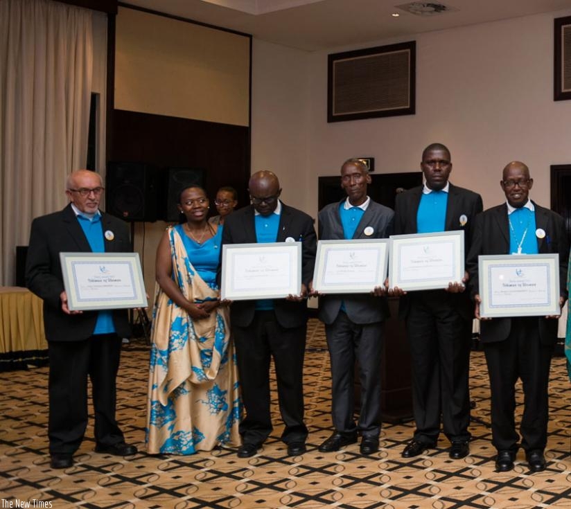 Dr Nsanzabaganwa(2nd left) poses for a group photo with some of the Unity Award winners in Kigali, last week. (Courtesy)