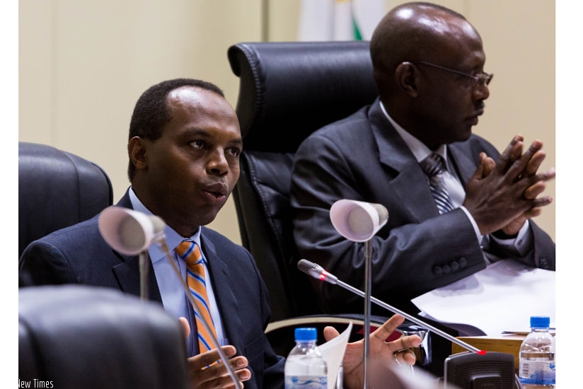 RDB chief executive Francis Gatare (L) addresses Parliament's Chamber of Deputies yesterday as Deputy Speaker, Abbas Mukama, looks on. (Timothy Kisambira)