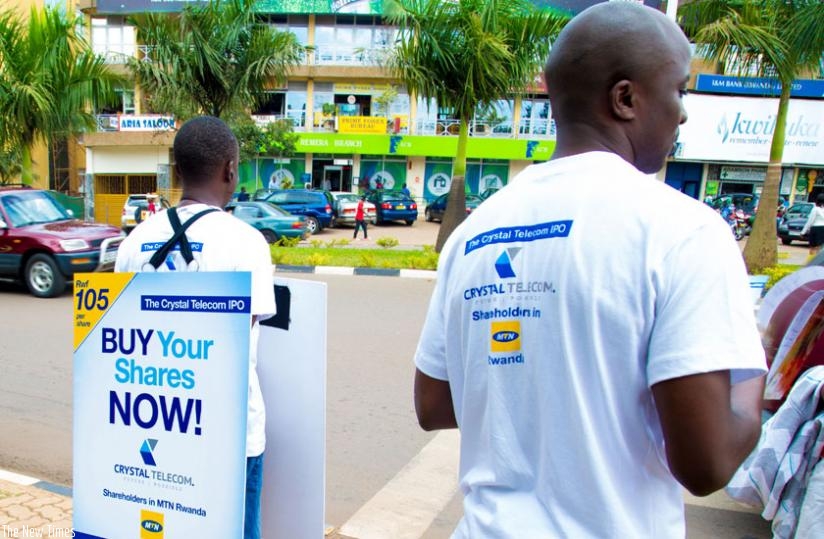 Crystal Telecom workers sell shares in Remera, Kigali, earlier this year. (File)