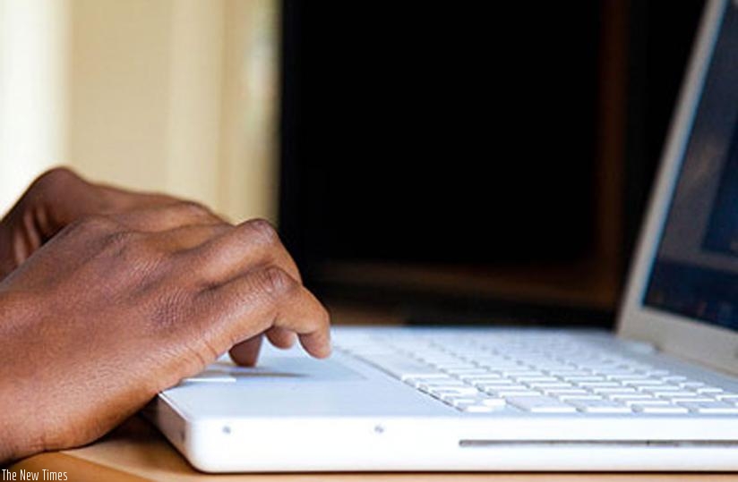 A man uses a laptop to surf the net. Cyber crime is on the rise in Africa. (File)
