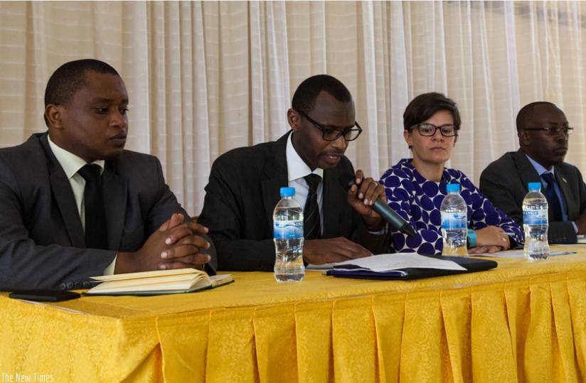 Minister for Education Papias Musafiri (2nd left) opens the workshop yesterday. With him is the State Minister for Primary and Secondary Education, Olivier Rwamukwaya (L), the head of UK's DFID, Laure Beaufils (2nd right) and the permanent secretary at the Ministry, Celestin Ntivuguruzwa (R). (Faustin Niyigena)