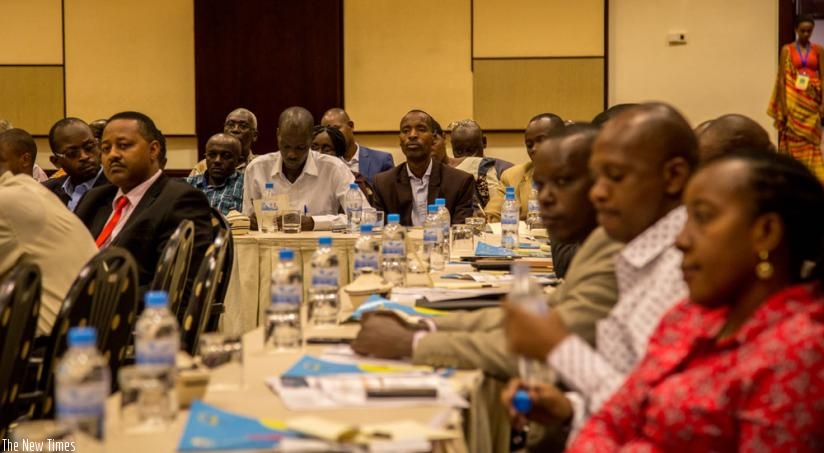 Participants follow a presentation on HIV AIDS prevalence in cities yesterday at Serena Hotel. (Doreen Umutesi)