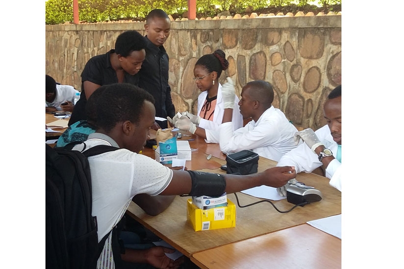 Students undergo blood glucose screening. (Sharon Kantengwa)rn